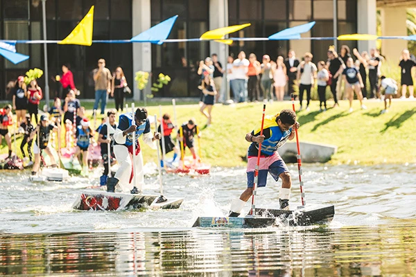 Architecture students competing in Walk on Water at Green Lake.