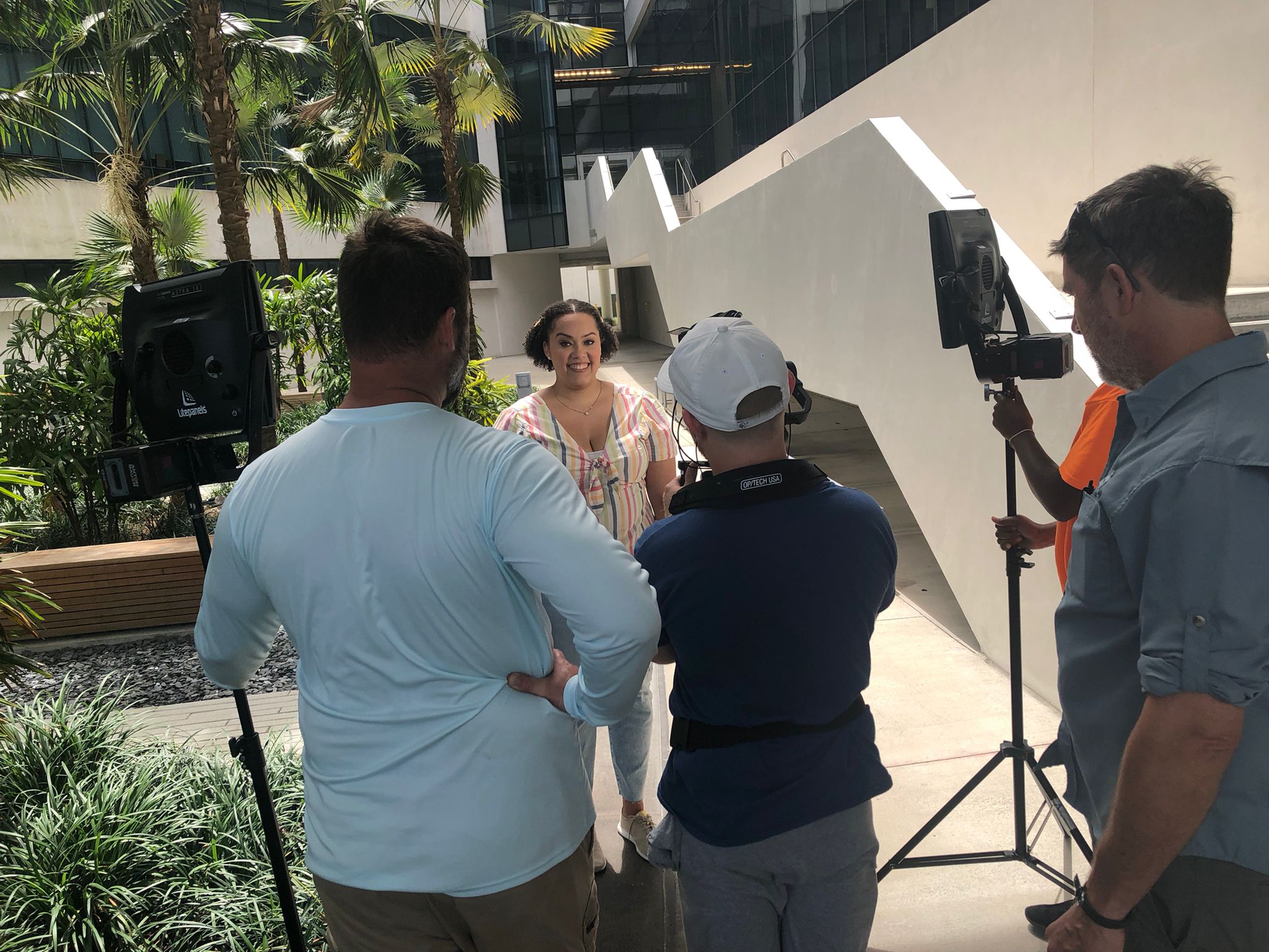 Britney Shick films her segment of The College Tour outside of Academic Health Center 5 at Florida International University.