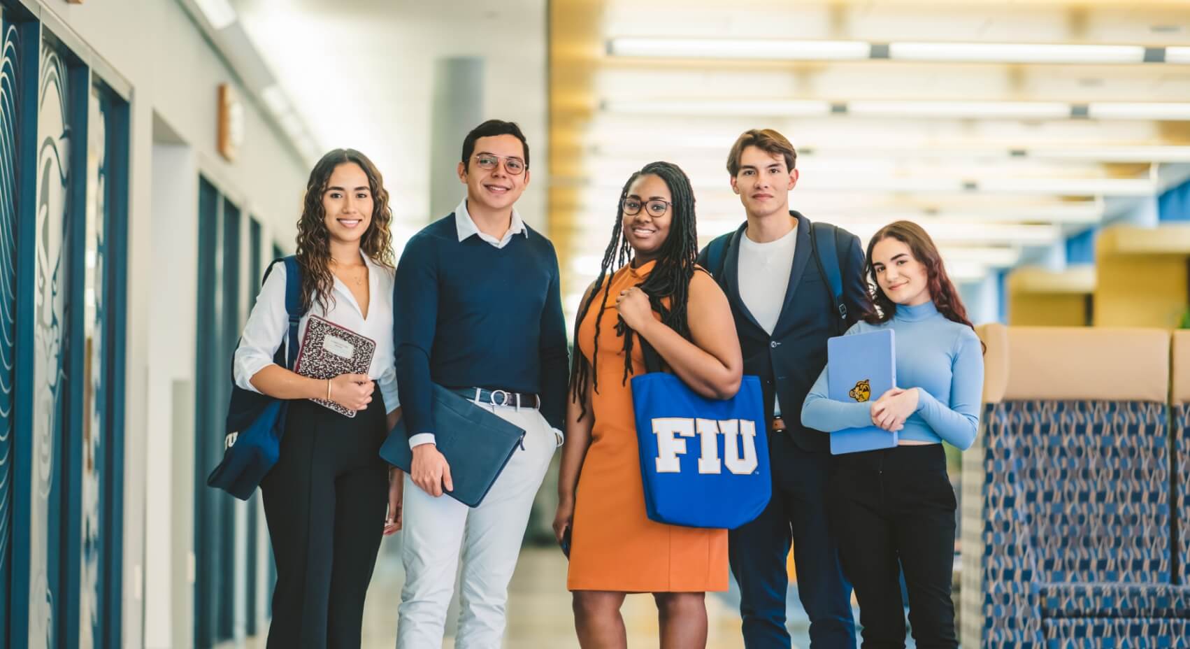 FIU students stand proud at the College of Business